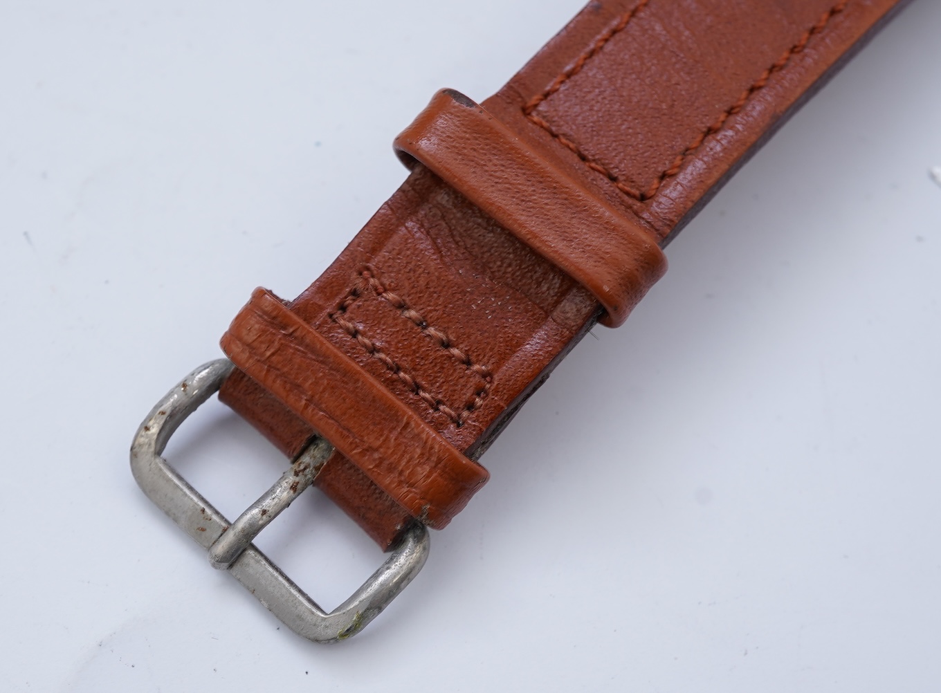 A gentleman's 1950's 18ct gold Zenith manual wind wrist watch
